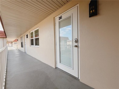 Golf + water views from this completely redone, fully furnished on The American Golf Club in Florida - for sale on GolfHomes.com, golf home, golf lot