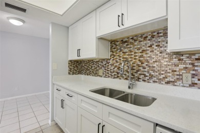 Discover the charm of this beautifully renovated 1 Bedroom, 1 on Clearwater Executive Golf Course in Florida - for sale on GolfHomes.com, golf home, golf lot