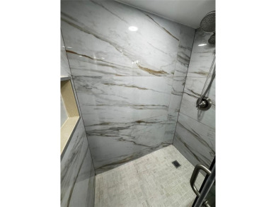 Step into luxury with this beautifully 2/2 condo located in the on Palm-Aire Country Club and Resort - Palms in Florida - for sale on GolfHomes.com, golf home, golf lot