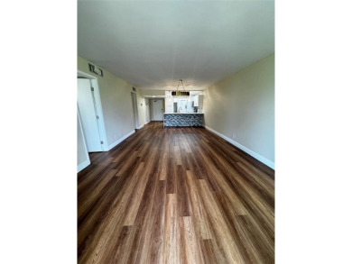 Step into luxury with this beautifully 2/2 condo located in the on Palm-Aire Country Club and Resort - Palms in Florida - for sale on GolfHomes.com, golf home, golf lot