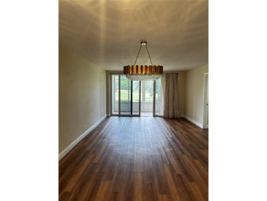Step into luxury with this beautifully 2/2 condo located in the on Palm-Aire Country Club and Resort - Palms in Florida - for sale on GolfHomes.com, golf home, golf lot
