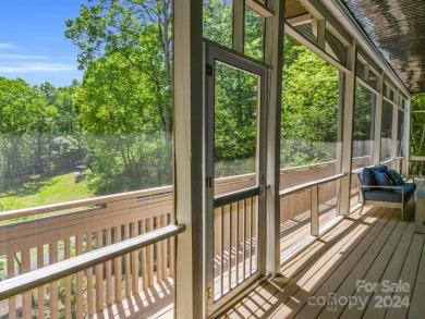 Nicely updated home, overlooking the 11th green of the Bald on Rumbling Bald Resort on Lake Lure in North Carolina - for sale on GolfHomes.com, golf home, golf lot