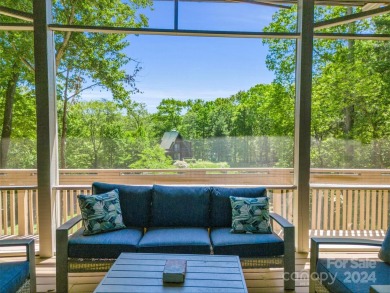 Nicely updated home, overlooking the 11th green of the Bald on Rumbling Bald Resort on Lake Lure in North Carolina - for sale on GolfHomes.com, golf home, golf lot