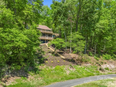 Nicely updated home, overlooking the 11th green of the Bald on Rumbling Bald Resort on Lake Lure in North Carolina - for sale on GolfHomes.com, golf home, golf lot