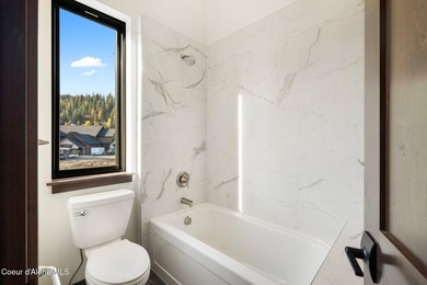 This brand-new upscale home is your exclusive gateway to four on The Idaho Club in Idaho - for sale on GolfHomes.com, golf home, golf lot