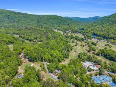 Nicely updated home, overlooking the 11th green of the Bald on Rumbling Bald Resort on Lake Lure in North Carolina - for sale on GolfHomes.com, golf home, golf lot