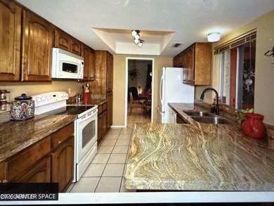 3 bedroom townhouse. Vaulted ceiling, beehive fireplace & dining on Rio Verde Country Club - Quail Run in Arizona - for sale on GolfHomes.com, golf home, golf lot