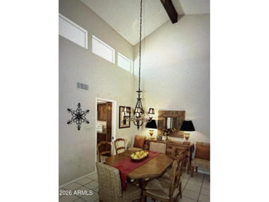 3 bedroom townhouse. Vaulted ceiling, beehive fireplace & dining on Rio Verde Country Club - Quail Run in Arizona - for sale on GolfHomes.com, golf home, golf lot