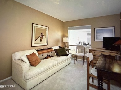 3 bedroom townhouse. Vaulted ceiling, beehive fireplace & dining on Rio Verde Country Club - Quail Run in Arizona - for sale on GolfHomes.com, golf home, golf lot