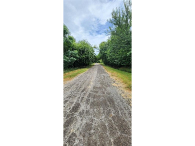 This 0.17-acre lot is adjacent to the new golf course at White on White Bluff Resort - New Course in Texas - for sale on GolfHomes.com, golf home, golf lot