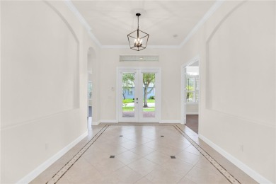 Beautifully updated estate home situated alongside Pointe West's on The Club At Pointe West in Florida - for sale on GolfHomes.com, golf home, golf lot