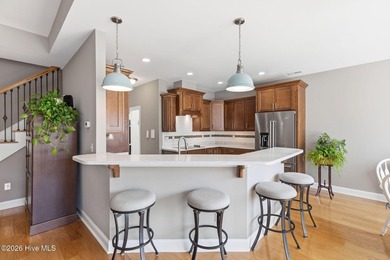 It is all about the view! This charming 3BR/2BA home has an on Carolina National Golf Club in North Carolina - for sale on GolfHomes.com, golf home, golf lot