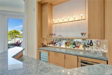 Discover your coastal contemporary dream home in the prestigious on Sailfish Point Golf Club, Inc. in Florida - for sale on GolfHomes.com, golf home, golf lot