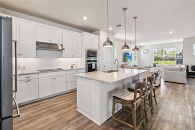 Welcome to your dream home in the gorgeous gated community of on Eagle Creek Golf Club in Florida - for sale on GolfHomes.com, golf home, golf lot