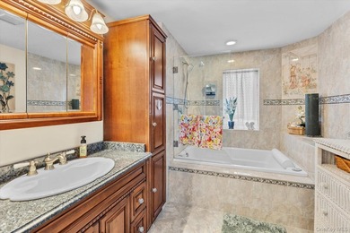 This rarely available end unit at the Bluffs in Baiting Hollow on Baiting Hollow Club in New York - for sale on GolfHomes.com, golf home, golf lot