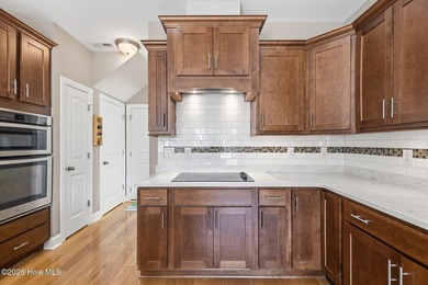 It is all about the view! This charming 3BR/2BA home has an on Carolina National Golf Club in North Carolina - for sale on GolfHomes.com, golf home, golf lot