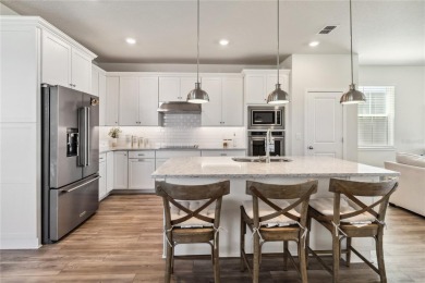 Welcome to your dream home in the gorgeous gated community of on Eagle Creek Golf Club in Florida - for sale on GolfHomes.com, golf home, golf lot