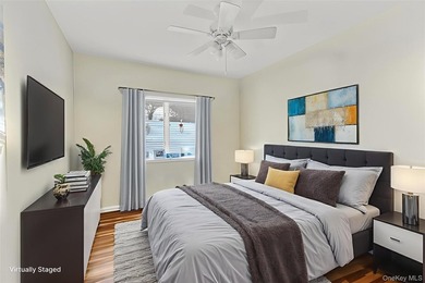 This rarely available end unit at the Bluffs in Baiting Hollow on Baiting Hollow Club in New York - for sale on GolfHomes.com, golf home, golf lot