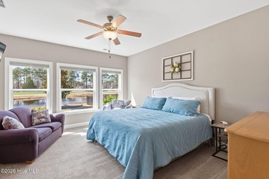 It is all about the view! This charming 3BR/2BA home has an on Carolina National Golf Club in North Carolina - for sale on GolfHomes.com, golf home, golf lot