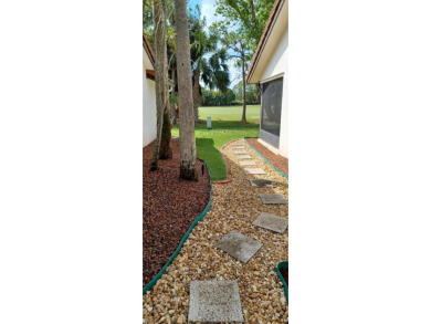 Welcome to this beautifully maintained 3BR, 2BA home in the on Martin Downs Country Club in Florida - for sale on GolfHomes.com, golf home, golf lot