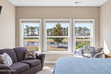 It is all about the view! This charming 3BR/2BA home has an on Carolina National Golf Club in North Carolina - for sale on GolfHomes.com, golf home, golf lot