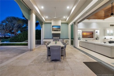 Discover your coastal contemporary dream home in the prestigious on Sailfish Point Golf Club, Inc. in Florida - for sale on GolfHomes.com, golf home, golf lot