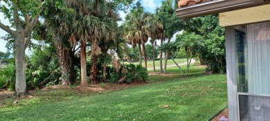 Welcome to this beautifully maintained 3BR, 2BA home in the on Martin Downs Country Club in Florida - for sale on GolfHomes.com, golf home, golf lot