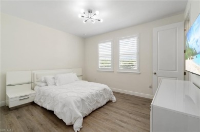 This 4-bedroom + den, 3 full-bath, 2 half-bath home in the gated on Vanderbilt Country Club in Florida - for sale on GolfHomes.com, golf home, golf lot