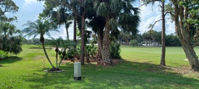 Welcome to this beautifully maintained 3BR, 2BA home in the on Martin Downs Country Club in Florida - for sale on GolfHomes.com, golf home, golf lot