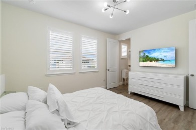 This 4-bedroom + den, 3 full-bath, 2 half-bath home in the gated on Vanderbilt Country Club in Florida - for sale on GolfHomes.com, golf home, golf lot