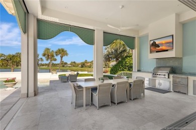 Discover your coastal contemporary dream home in the prestigious on Sailfish Point Golf Club, Inc. in Florida - for sale on GolfHomes.com, golf home, golf lot