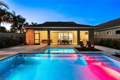 This 4-bedroom + den, 3 full-bath, 2 half-bath home in the gated on Vanderbilt Country Club in Florida - for sale on GolfHomes.com, golf home, golf lot