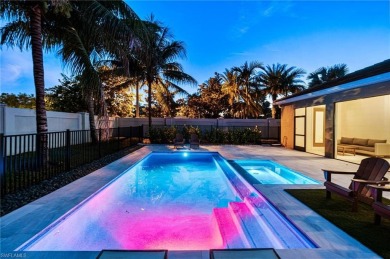This 4-bedroom + den, 3 full-bath, 2 half-bath home in the gated on Vanderbilt Country Club in Florida - for sale on GolfHomes.com, golf home, golf lot