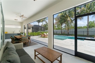 This 4-bedroom + den, 3 full-bath, 2 half-bath home in the gated on Vanderbilt Country Club in Florida - for sale on GolfHomes.com, golf home, golf lot