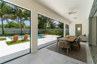 This 4-bedroom + den, 3 full-bath, 2 half-bath home in the gated on Vanderbilt Country Club in Florida - for sale on GolfHomes.com, golf home, golf lot