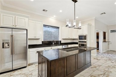 Introducing 118 Beau Chasse, a beautifully updated residence on Beau Chene Country Club in Louisiana - for sale on GolfHomes.com, golf home, golf lot