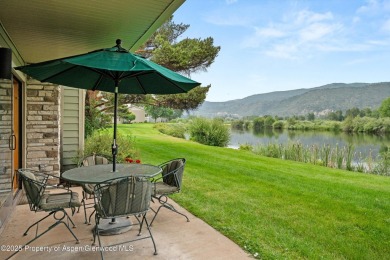 Rarely available and highly desirable ground floor pondside on Ranch at Roaring Fork Golf Course in Colorado - for sale on GolfHomes.com, golf home, golf lot
