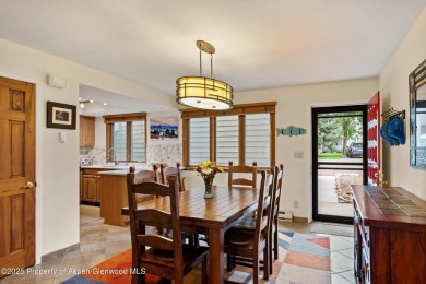 Rarely available and highly desirable ground floor pondside on Ranch at Roaring Fork Golf Course in Colorado - for sale on GolfHomes.com, golf home, golf lot