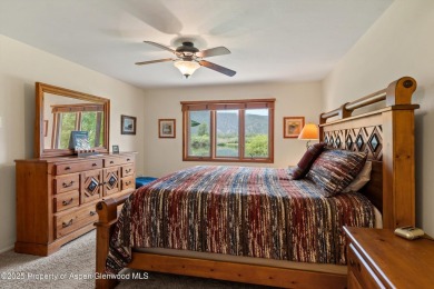Rarely available and highly desirable ground floor pondside on Ranch at Roaring Fork Golf Course in Colorado - for sale on GolfHomes.com, golf home, golf lot
