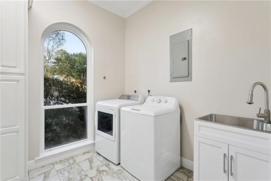 Introducing 118 Beau Chasse, a beautifully updated residence on Beau Chene Country Club in Louisiana - for sale on GolfHomes.com, golf home, golf lot