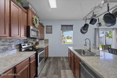 Now available in Magnolia West! 4 bedrooms w/ huge backyard on a on Magnolia Point Golf and Country Club in Florida - for sale on GolfHomes.com, golf home, golf lot