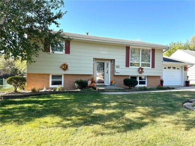 Welcome to 350 Lake Hill Drive! This 4-bed, 2-bath split-foyer on Worthington Country Club in Minnesota - for sale on GolfHomes.com, golf home, golf lot