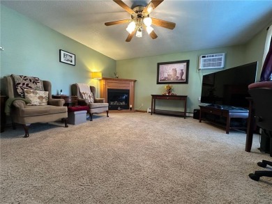 Welcome to 350 Lake Hill Drive! This 4-bed, 2-bath split-foyer on Worthington Country Club in Minnesota - for sale on GolfHomes.com, golf home, golf lot