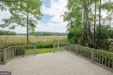 Wow! This extraordinary custom-built home on the marsh is a one on The Club At Osprey Cove in Georgia - for sale on GolfHomes.com, golf home, golf lot