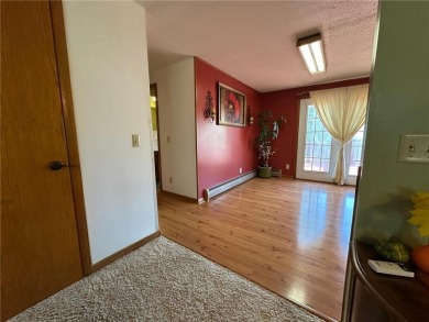 Welcome to 350 Lake Hill Drive! This 4-bed, 2-bath split-foyer on Worthington Country Club in Minnesota - for sale on GolfHomes.com, golf home, golf lot