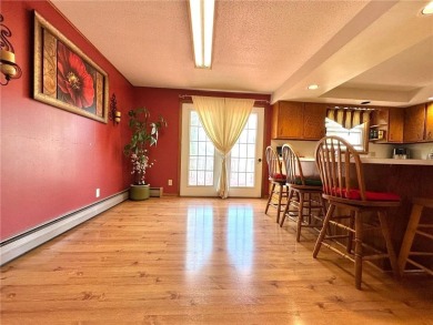 Welcome to 350 Lake Hill Drive! This 4-bed, 2-bath split-foyer on Worthington Country Club in Minnesota - for sale on GolfHomes.com, golf home, golf lot