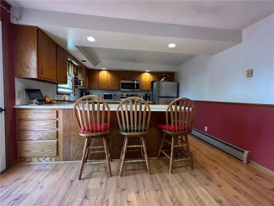 Welcome to 350 Lake Hill Drive! This 4-bed, 2-bath split-foyer on Worthington Country Club in Minnesota - for sale on GolfHomes.com, golf home, golf lot