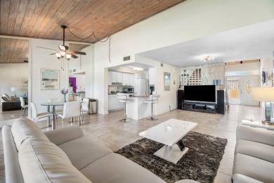 Discover resort-style living at its finest in this rarely on PGA National Golf Club in Florida - for sale on GolfHomes.com, golf home, golf lot