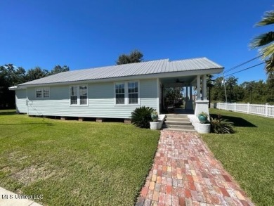 This lovingly renovated craftsman type cottage built in 1919 is on The Bridges Golf Club At Hollywood Casino in Mississippi - for sale on GolfHomes.com, golf home, golf lot