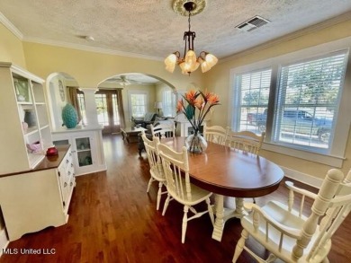 This lovingly renovated craftsman type cottage built in 1919 is on The Bridges Golf Club At Hollywood Casino in Mississippi - for sale on GolfHomes.com, golf home, golf lot